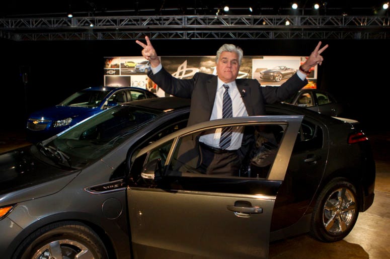 jay leno standing by car