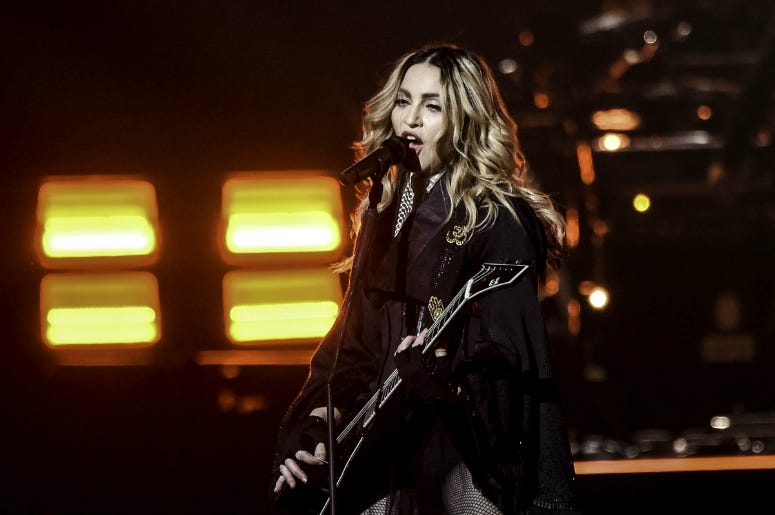 Jan 23, Miami, FL, USA; Recording artist Madonna performs during her Rebel Heart Tour stop at the American Airlines Center. Jan 23, Miami, FL, USA; Recording artist Madonna performs during her Rebel Heart Tour stop at the American Airlines Center.