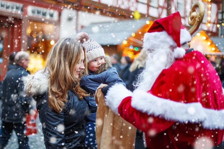 family meet santa at holiday market