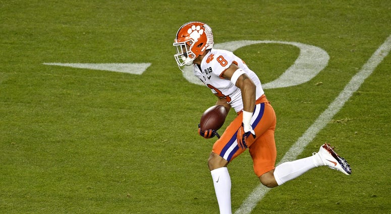 Jan 7, 2019; Santa Clara, CA, USA; Clemson Tigers cornerback A.J. Terrell (8) runs a interception for a touchdown against the Alabama Crimson Tide during the first quarter during the 2019 College Football Playoff Championship game at Levi's Stadium. Manda A.J. Terrell