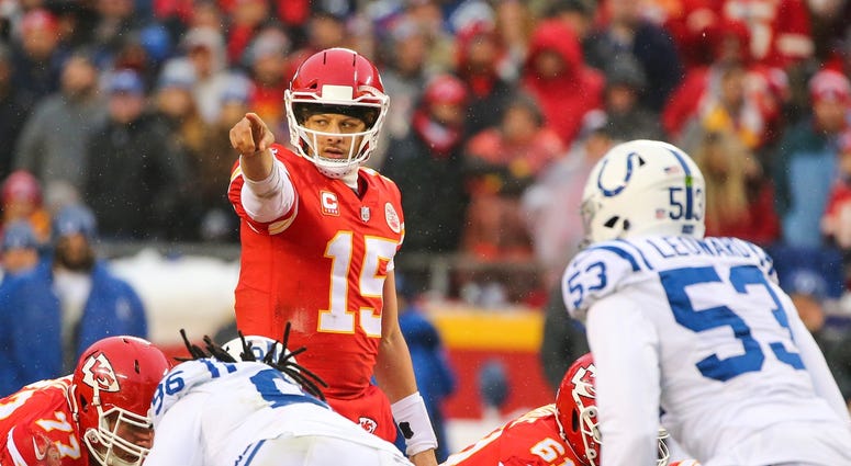 Jan 12, 2019; Kansas City, MO, USA; Kansas City Chiefs quarterback Patrick Mahomes (15) checks the defense before the snap against the Indianapolis Colts in an AFC Divisional playoff football game at Arrowhead Stadium. Mandatory Credit: Jay Biggerstaff-US