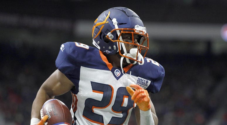 Feb 17, 2019; San Antonio, TX, USA; Orlando Apollos corner back Keith Reaser (29) runs the ball after making an interception during the second half against the San Antonio Commanders at The Alamodome. Mandatory Credit: Soobum Im-USA TODAY Sports