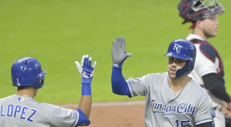 Jun 24, 2019; Cleveland, OH, USA; Kansas City Royals right fielder Whit Merrifield (15) celebrates his solo home run with second baseman Nicky Lopez (1) in the fourth inning against the Cleveland Indians at Progressive Field. Mandatory Credit: David Richa