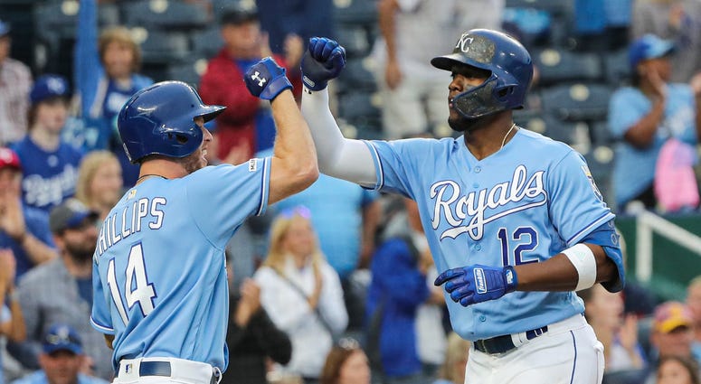 Sep 28, 2019; Kansas City, MO, USA; Kansas City Royals designated hitter Jorge Soler (12) is congratulated by center fielder Brett Phillips (14) after hitting a home run against the Minnesota Twins during the seventh inning at Kauffman Stadium. Mandatory Jorge Soler Home Run