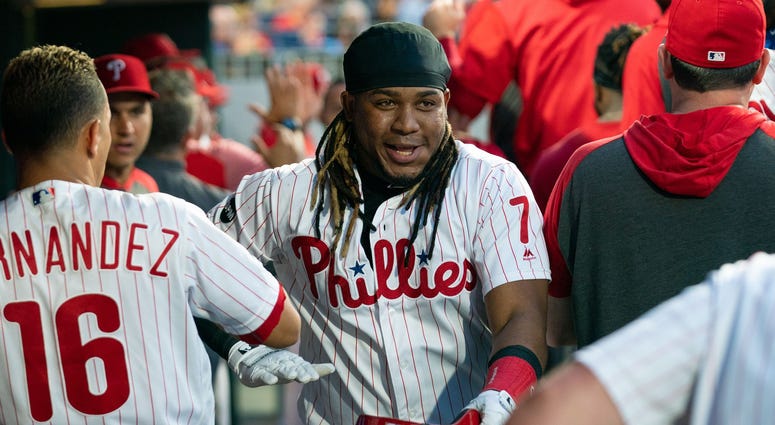 Sep 28, 2019; Philadelphia, PA, USA; Philadelphia Phillies third baseman Maikel Franco (7) celebrates with teammates after hitting a two RBI home run during the second inning against the Miami Marlins at Citizens Bank Park. Mandatory Credit: Bill Streiche Maikel Franco