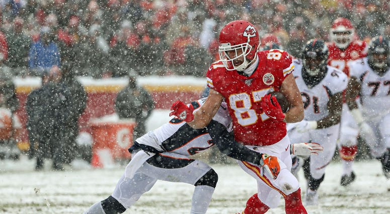Dec 15, 2019; Kansas City, MO, USA; Kansas City Chiefs tight end Travis Kelce (87) is tackled by Denver Broncos cornerback Chris Harris (25) during the first half at Arrowhead Stadium. Mandatory Credit: Jay Biggerstaff-USA TODAY Sports Pro Bowl