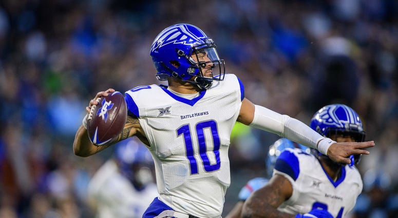 Feb 9, 2020; Arlington, Texas, USA; St. Louis Battlehawks quarterback Jordan Ta'amu (10) passes against the Dallas Renegades during the second half in an XFL football game at Globe Life Park. Mandatory Credit: Jerome Miron-USA TODAY Sports Jordan Ta'amu