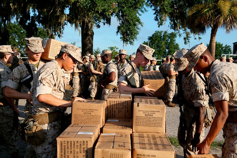 In this photo released by the U.S. Marine Corps, recruits at Marine Corps Recruit Depot Parris Island, S.C., prepare to evacuate to Marine Corps Logistic Base Albany following an evacuation order directed by Brig. Gen. James Glynn, the depot's commanding In this photo released by the U.S. Marine Corps, recruits at Marine Corps Recruit Depot Parris Island, S.C., prepare to evacuate to Marine Corps Logistic Base Albany following an evacuation order directed by Brig. Gen. James Glynn, the depot's commanding