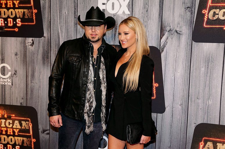 Recording artist Jason Aldean (L) and Brittany Kerr attend the 2014 American Country Countdown Awards at Music City Center on December 15, 2014 in Nashville, Tennessee Recording artist Jason Aldean (L) and Brittany Kerr attend the 2014 American Country Countdown Awards at Music City Center on December 15, 2014 in Nashville, Tennessee