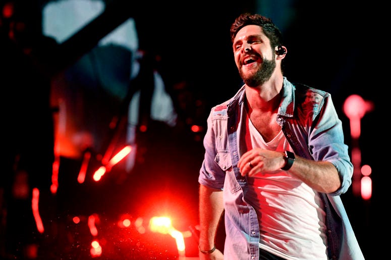 Thomas Rhett performs during the 2018 CMA Music Festival Thomas Rhett performs during the 2018 CMA Music Festival