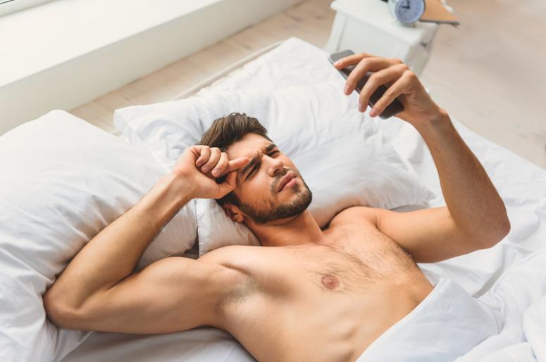 Man in Bed with Phone Man in Bed with Phone