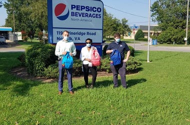 Pepsi donates 200 backpacks to Reading & Succeeding