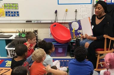 Reading to the babies at Holland Elementary Reading & Succeeding