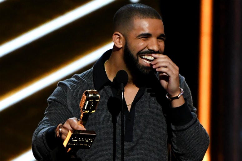Drake Recording artist Drake accepts the Top Billboard 200 Album award for 'Views' onstage during the 2017 Billboard Music Awards at T-Mobile Arena on May 21, 2017 in Las Vegas, Nevada.