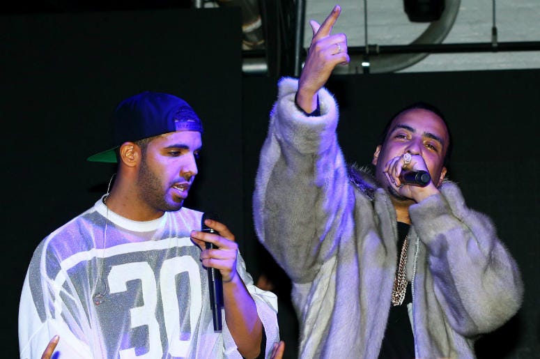 Drake & French Montana Recording artist/rapper Drake (left) French Montana (center) and Sean Combs aka Diddy during the Revolt Party at the Time Warner Cable Studios.