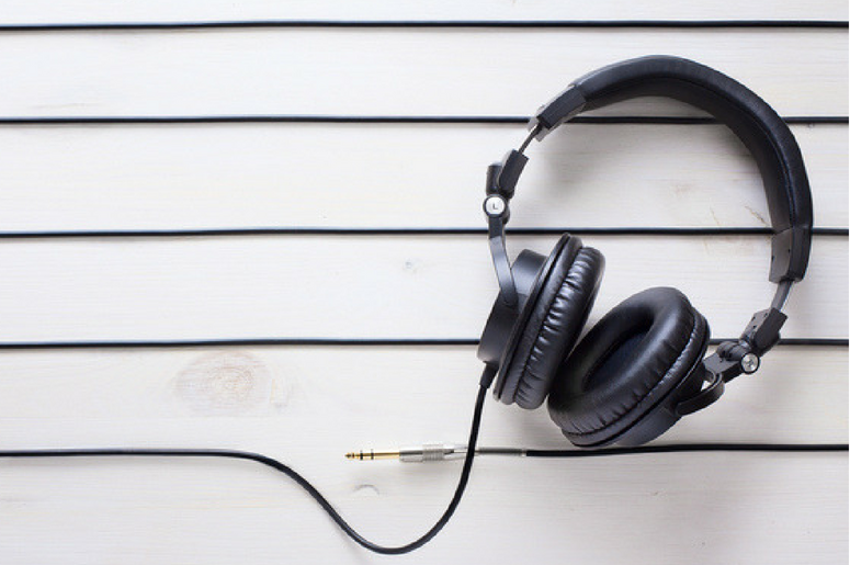 Art music studio background with dj headphones Art music studio background with dj headphones