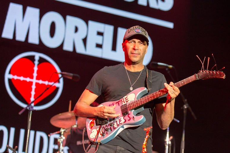 Tom Morello performs with X Ambassadors during KROQ Almost Acoustic Christmas Tom Morello performs with X Ambassadors during KROQ Almost Acoustic Christmas