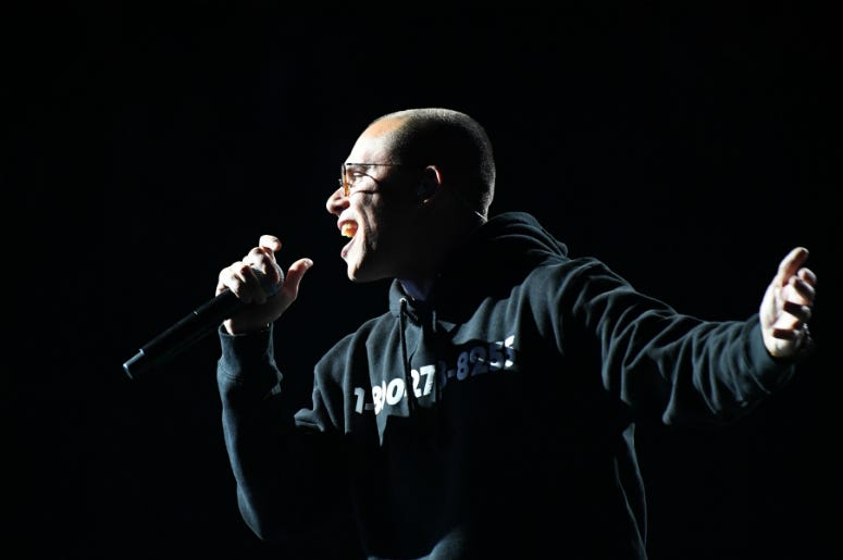 Logic performs 1-800-273-8255 during the 60th Annual Grammy Awards at Madison Square Garden. Logic performs 1-800-273-8255 during the 60th Annual Grammy Awards at Madison Square Garden.