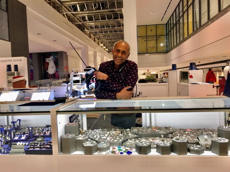 George Thomas, the owner of jewelry kiosk Creative Silver in the Fashion District.