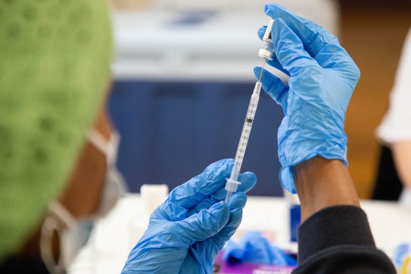 Nurses contracted with the Leon County Health Department fill syringes with doses of the Pfizer COVID-19 vaccine at Bethel AME Church Sunday, Jan. 10, 2021. Bethel Ame Vaccines 011021 Ts 045