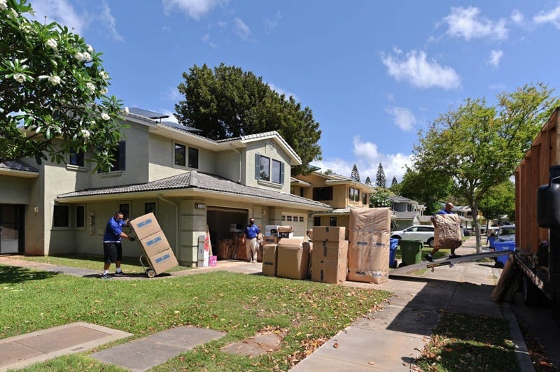 Household Goods Inspector, Faata Leafa, performing an inspection of a household goods packout performed by Aloha International.