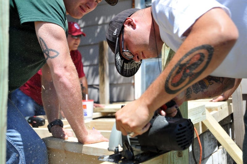 Fort Riley soldiers gathered in Junction City June 15 to build a wheelchair ramp for a local man.