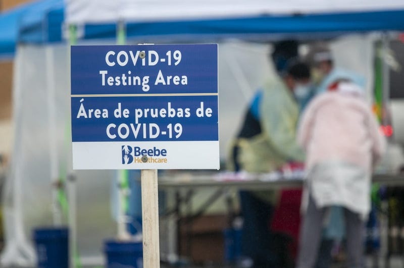 Signage for the COVID-19 Testing Area is saturated by rain at a coronavirus testing site on the grounds of the Sussex County VA Community-Based Outpatient Clinic in Georgetown, Delaware, May 6, 2020.