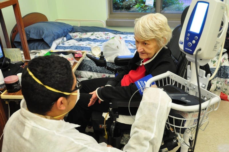U.S. Army Spc. Jabari Ashanti, a Combat Medic with the 1st Battalion, 114th Infantry Regiment, New Jersey Army National Guard (NJARNG), checks a resident’s blood pressure at the New Jersey Veterans Memorial Home at Menlo Park in Edison, N.J., April 2020.