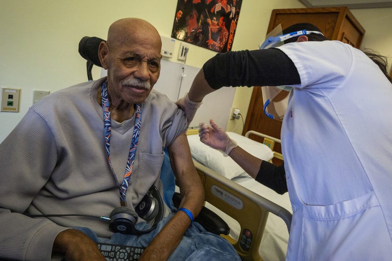 Resident Robert Goines receives the COVID-19 vaccination at the New Jersey Veterans Memorial Home at Menlo Park, Edison, N.J., Jan. 5, 2021. These are the first vaccinations administered at the Home under the Federal Pharmacy Program.