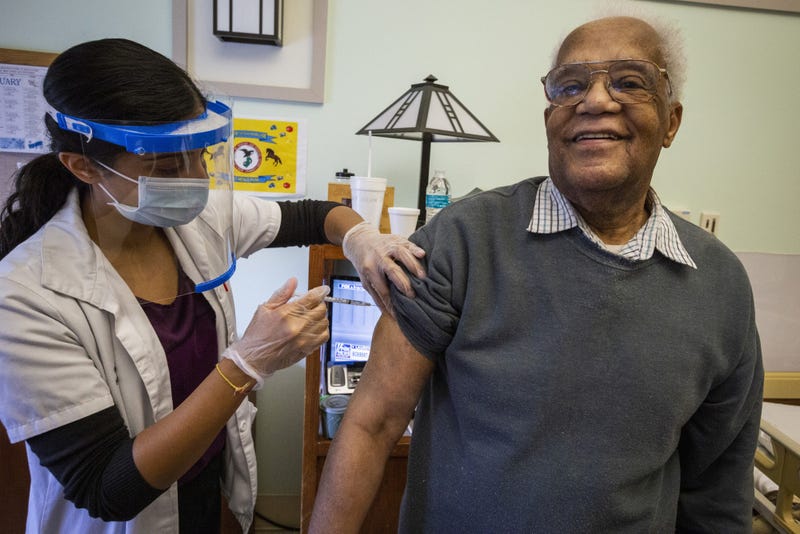 Resident Carl Wilson receives the COVID-19 vaccination at the New Jersey Veterans Memorial Home at Menlo Park, Edison, N.J., Jan. 5, 2021. These are the first vaccinations administered at the Home under the Federal Pharmacy Program.