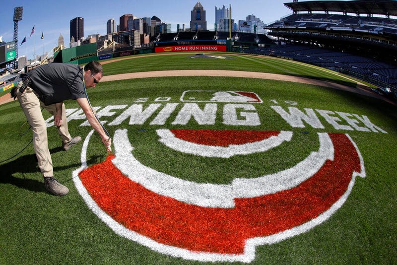 Andy Burnette, of the PNC Ground Crew paints, the Opening Week logo on the field at PNC Park Wednesday, March 27, 2019 in preparation for the Pittsburgh Pirates home-opener on Monday, April 1, against the St. Louis Cardinals