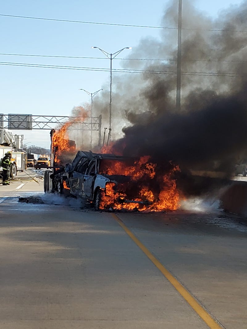 Two vehicles erupted in flames Thursday after a crash on the Regan Tollway near Naperville Road.