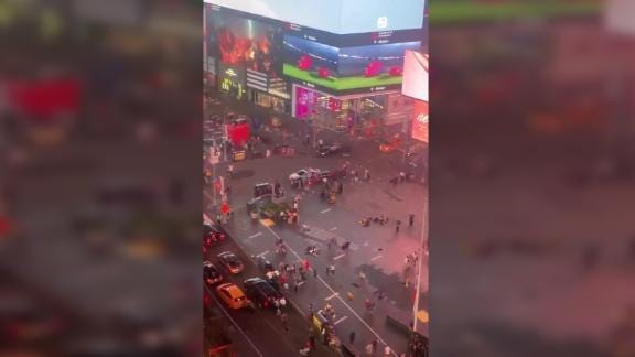 After recent shootings in the US left a combined total of at least 31 dead, police say motorcycles backfiring in the popular New York tourist destination Times Square led people to flee the area in fear that another shooting was taking place.