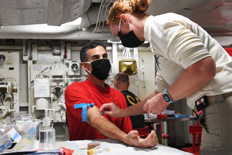 Navy Capt. Carlos Sardiello, commanding officer of the aircraft carrier USS Theodore Roosevelt