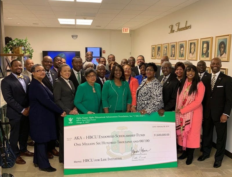Alpha Kappa Alpha International President Dr. Glenda Glover presents a check to HBCU representatives in 2019