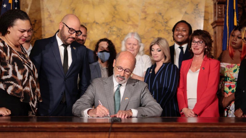 Gov. Tom Wolf signing an executive order Tuesday protecting LGBTQ Pennsylvanians from conversion therapy.