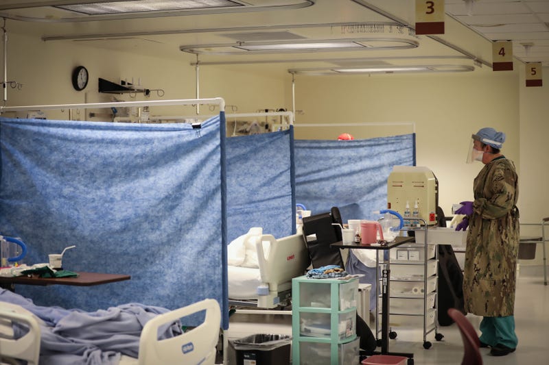 Navy Lt. Kathryn Hrezo, a critical care nurse with the Rural Rapid Response Team, prepares to check patients’ blood sugar levels, while working in the COVID-19 ward at the Northern Navajo Medical Center, Shiprock, N.M., Jan. 2, 2021. U.S. Northern Command, through U.S. Army North, remains committed to providing flexible Defense Department support to the whole-of-America COVID-19 response.