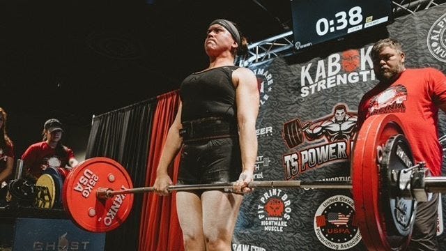 Navy nurse powerlifts to winner's podium