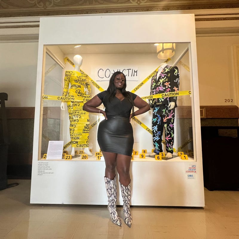 Artist and exhibit curator Zarinah Lomax describes her artwork as "a crime scene recreated through clothes."
