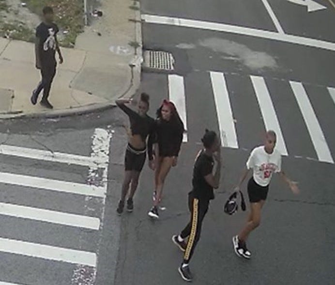 Surveillance images show the group near the scene of Saturday's beating outside the Arverne Playground in Edgemere
