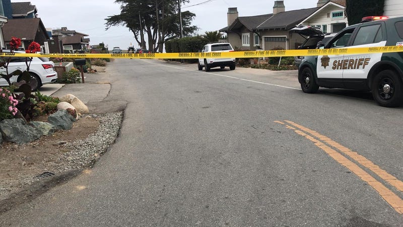 Police at the scene of where a car fell over a cliff at Sunny Cove Beach.