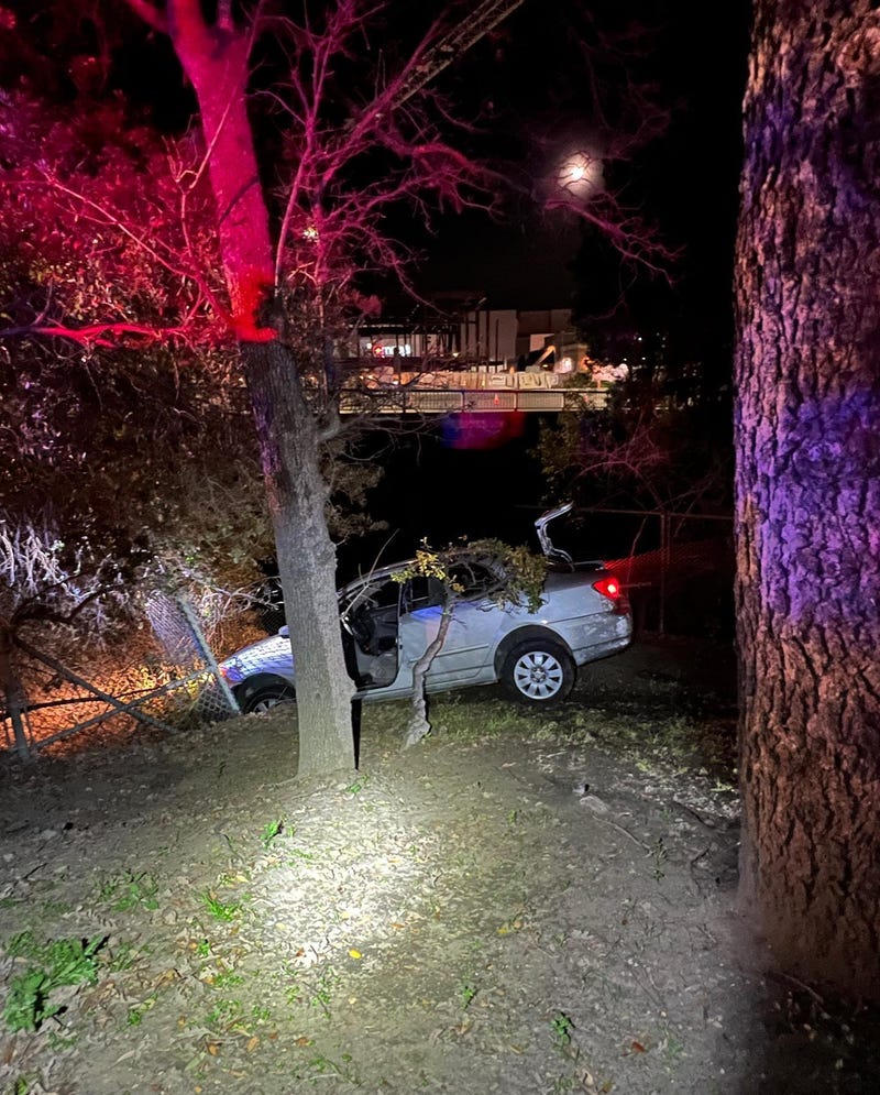 Two people have been arrested in the East Bay after they were found dangling off the side of a canal while allegedly attempting to flee police.