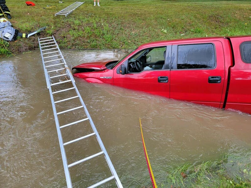 Firefighters had to work against the clock to save one person trapped inside a vehicle that crashed into a creek in Macomb County on Thursday.