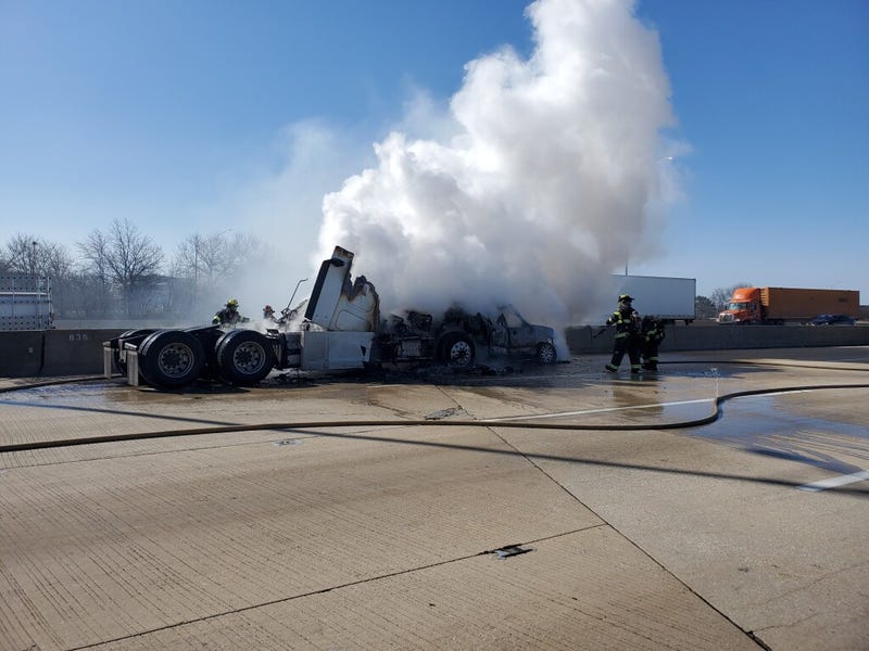 Two vehicles erupted in flames Thursday after a crash on the Regan Tollway near Naperville Road.