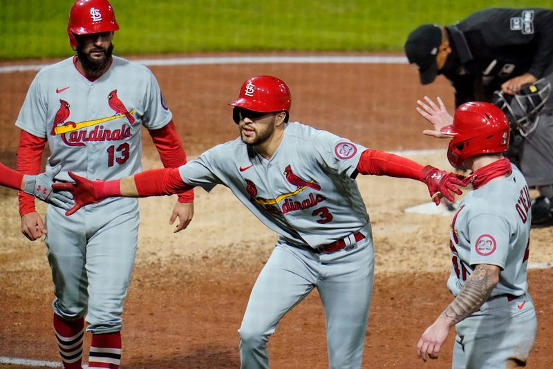 St. Louis Cardinals' Dylan Carlson celebrates as he heads to the dugout after hitting a three-run home run off Pittsburgh Pirates relief pitcher Chris Stratton during the sixth inning of the second baseball game of a doubleheader in Pittsburgh, Friday, Sept. 18, 2020.
