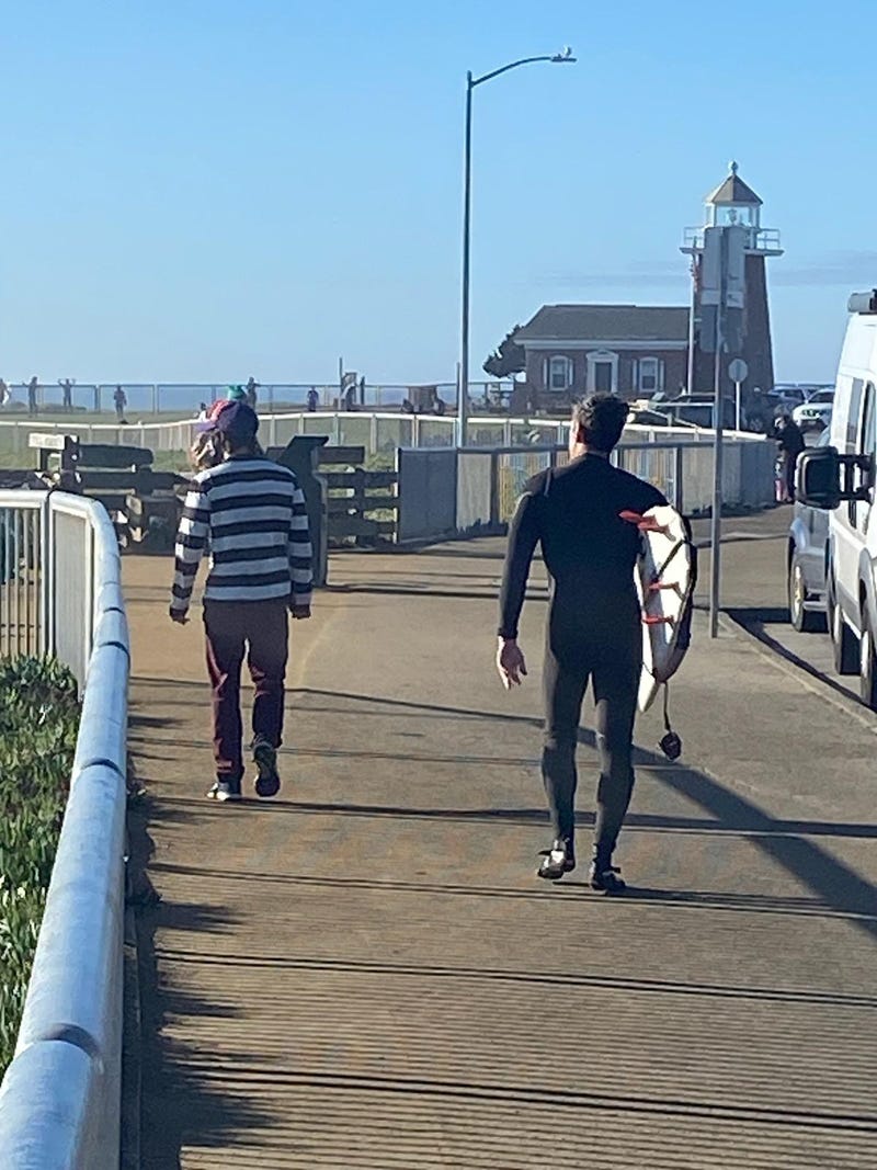Surfers hope for the right wave at Steamer Lane in Santa Cruz.