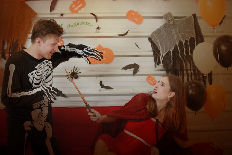 Costumed couple fake fights