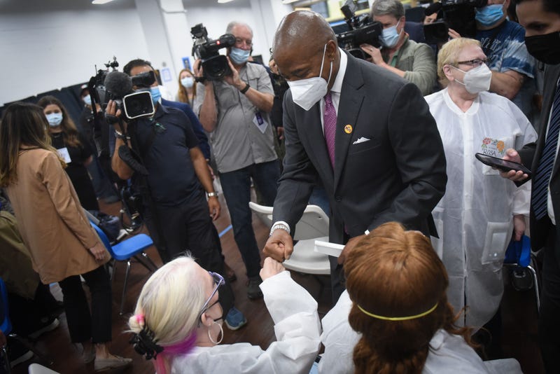 tours a COVID-19 vaccination site servicing children from six months through five years of age in Times Square on Wednesday, June 22, 2022.
