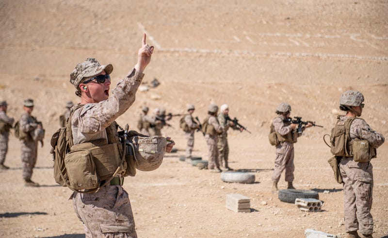 JORDAN (Aug. 1, 2019) Cpl. Riley Guidi, assigned to the 11th Marine Expeditionary Unit (MEU) Female Engagement Team, gives the course of fire to Marines and members of the Jordan Armed Forces Quick Reaction Force Female Engagement Team during a live-fire