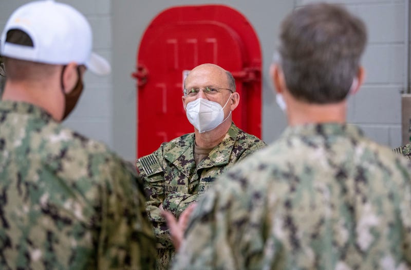 Chief of Naval Operations (CNO) Adm. Mike M. Gilday speaks to Recruit Training Command (RTC) staff members inside the USS Chief Fire Fighter Trainer at RTC